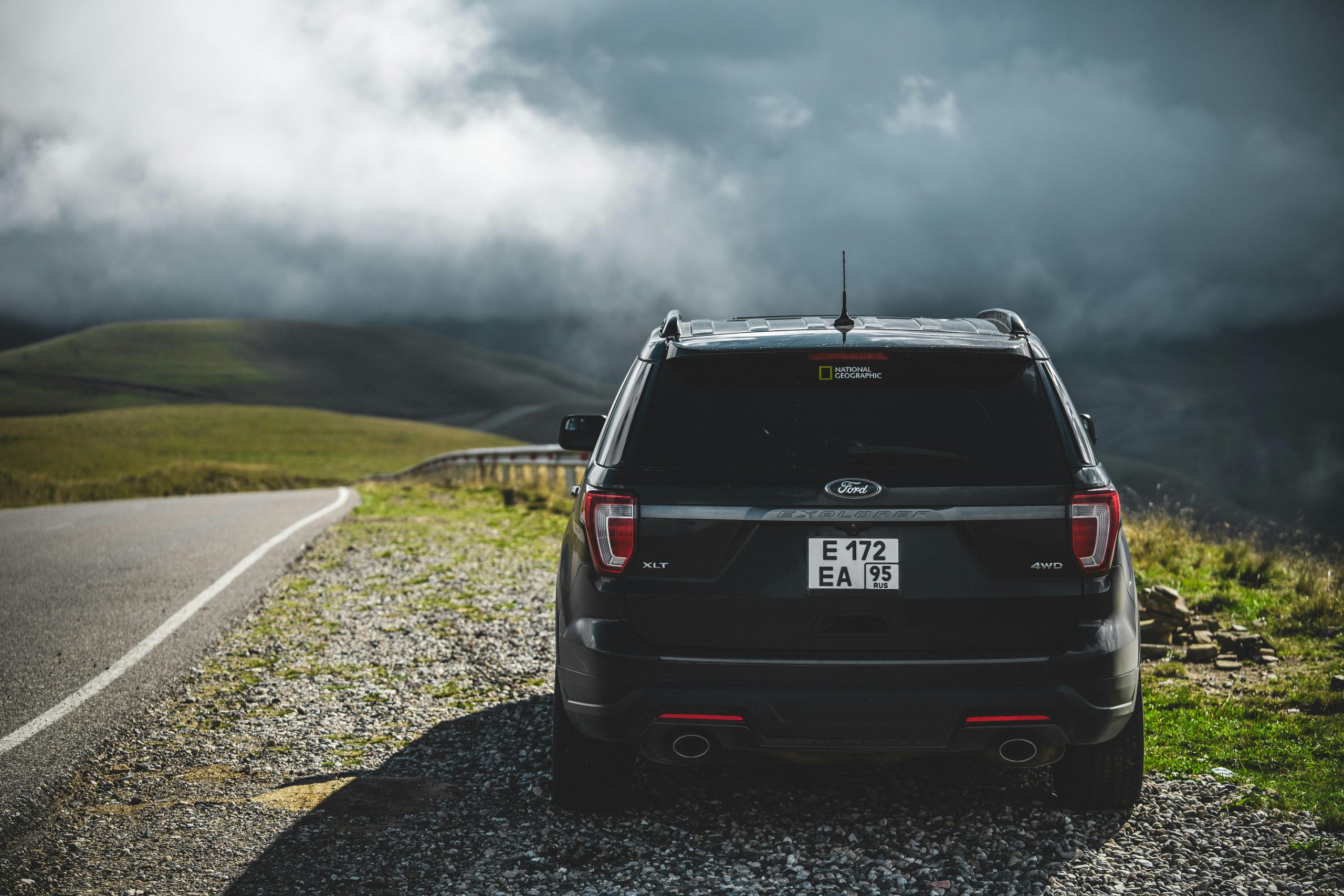 Black SUV on Scenic Mountain Road